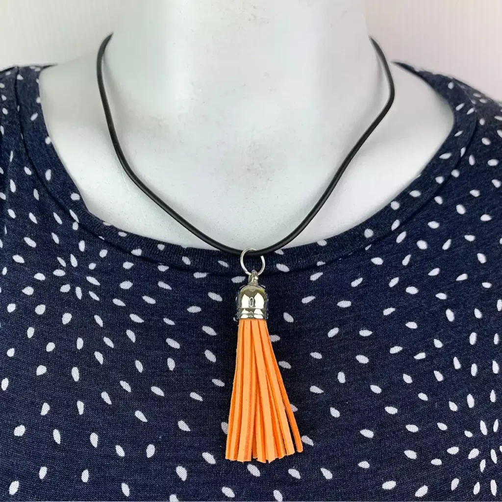 NL025-O-product-necklace-orange-tassel-black-cord-2